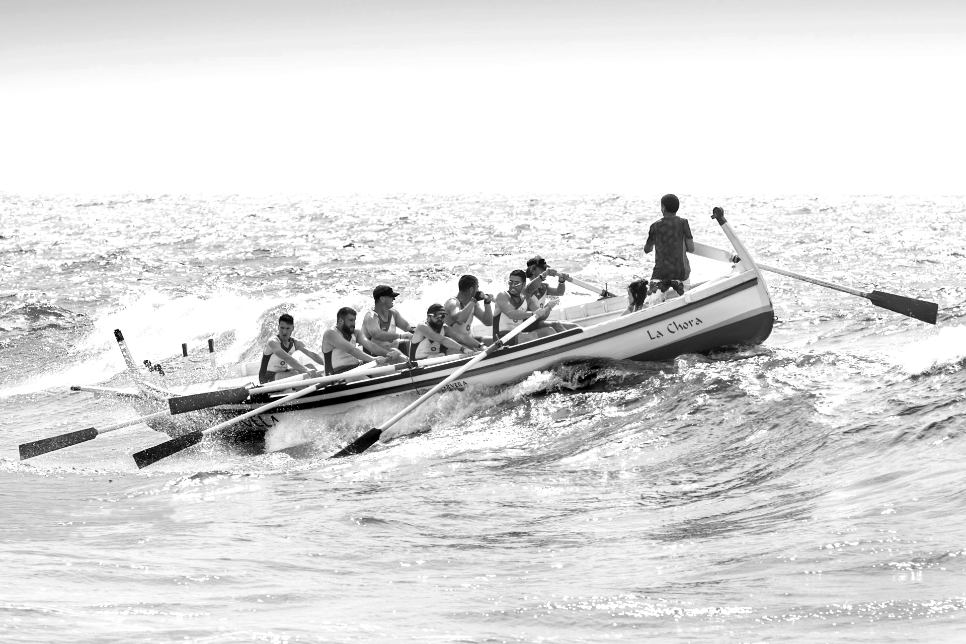 group of men riding boat